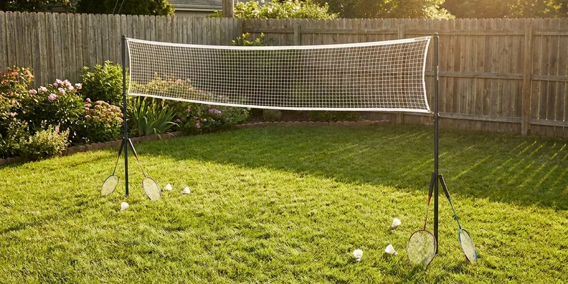 badminton set for backyard: backyard game setup on a lawn